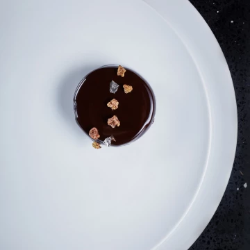 This was taken with executive pastry chef Andy Blas - such a simple, elegant chocolate torte with all the beautiful embellishment of silver leaf and nuts.<br />
<br />
It was for a commission by the wonderful Seasoned by Chefs magazine who I love shooting for.<br />
<br />
