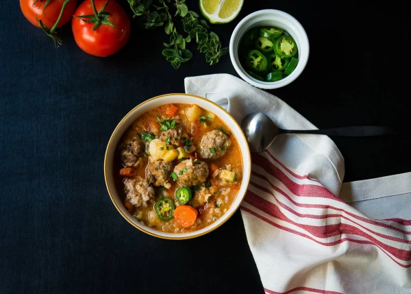 Sopa de Albondigas (Mexican meatball soup) is the perfect comfort food for wintry evenings.  I love its hearty feeling and rich flavors that warm me up from the inside.