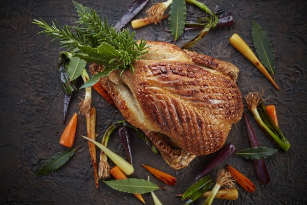 Another creation from the talented Adam Bennett - this time a roast duck with roast vegetables - now this is what you want for Thanksgiving or Christmas,  a nice change from turkey perhaps?!  Love the surface texture too - gorgeousness!<br />
<br />
Restaurant: Michelin starred The Cross: IG @thecrossatkenilworth<br />
Chef: Adam Bennett<br />
Photographer: @jodihindsphoto - www.jodihinds.com Represented by Hancock & Handsome