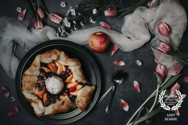 Fruit galette w/nectarines, blueberries, raspberries and a scoop of vanilla ice cream.  I was too lazy to make a pie so I made this galette instead.  I'm not sure why galettes aren't more common since they're so easy to make & delicious.